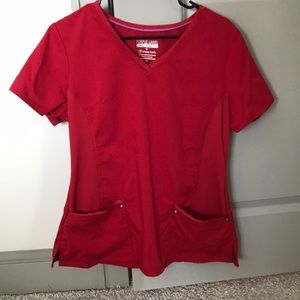 Red pair of healing hands scrubs